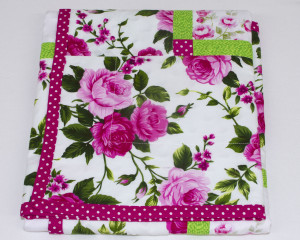 Cerise-patchwork-blanket-folded