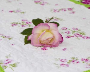 Cerise-cot-quilt-with-real-rose-Q000112