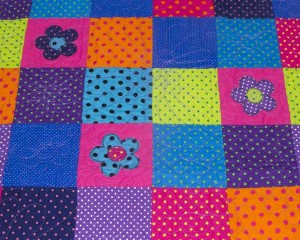 Dotty-About-You-patchwork-cot-quilt-detail-Q000117