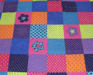 Dotty-About-You-patchwork-cot-quilt-detail