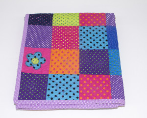 Dotty-About-You-patchwork-cot-quilt-folded