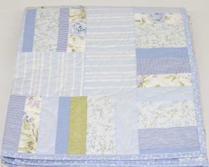 Misty-Blue-patchwork-cot-quilt-folded-Q000100