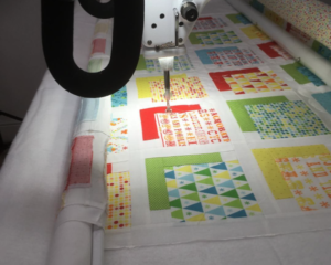 Customer quilt being quilted