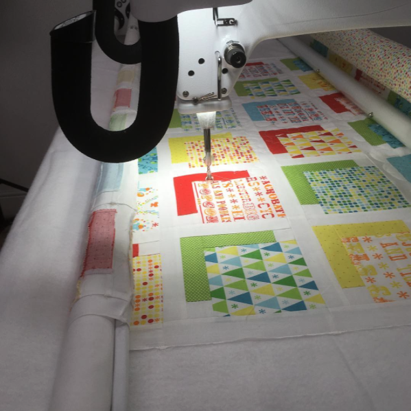 Customer quilt being quilted