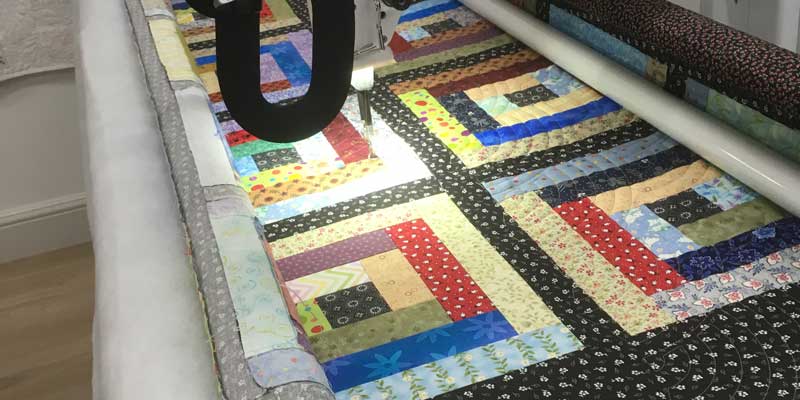 Customer quilt being quilted