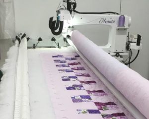 Customer quilt being quilted