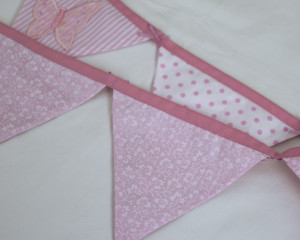 Applique embroidered butterfly bunting in pink showing reverse