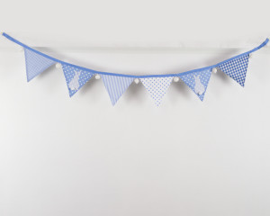 Bunny bunting in blue with white pom-poms
