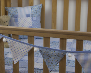 Rabbits-and-owls-bunting-blue-with-matching-blanket