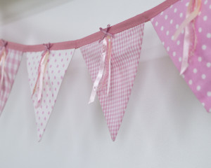 Ribbons and sequins bunting in pink