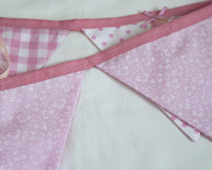 Ribbons and sequins bunting in pink showing reverse
