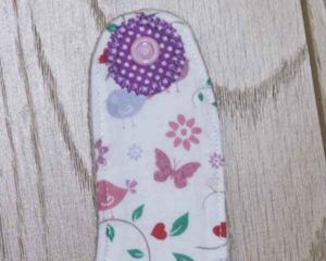 BB012 Butterflies and birds traditional bib reinforced popper