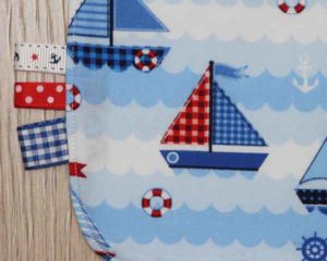 BB016 Blue Sailing traditional bib ribbon detail