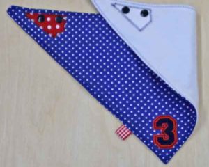 Navy-polka-dot-full-bandana-bib-3-motif-folded-back-BB030