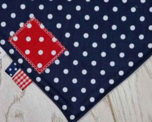 Navy-polka-dot-full-bandana-bib-red-patch-detail-BB001