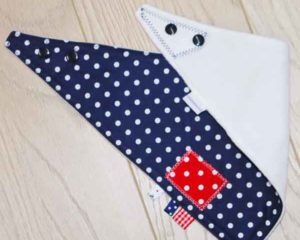Navy-polka-dot-full-bandana-bib-red-patch-folded-BB001