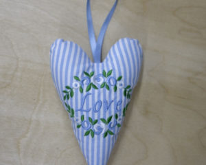 Blue heart with Love embroidery in floral oval front
