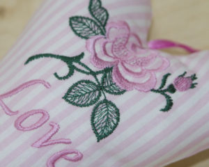 Love Heart single rose in pink close-up