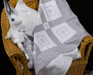 Emblem White and Silver-grey patchwork blanket