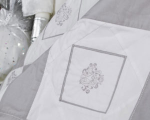 Emblem White and Silver-grey patchwork blanket
