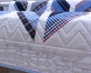 Chevron quilt pattern with family and cat border