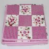 Daisy-May-patchwork-cot-quilt-folded-Q000111