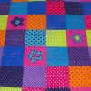 Dotty-About-You-patchwork-cot-quilt-detail-Q000117