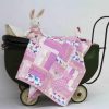 Fifi-and-Poppy-in-pram-with-Walkies-pink-blanket-B000106