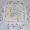 Misty-Blue-patchwork-cot-quilt-centre-detail-Q000100