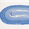 Oval-Blue-Variegated-crochet-blanket-with-frilly-edge-laid-flat-CB106