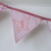 Applique embroidered butterfly bunting in pink