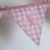 Applique embroidered butterfly bunting in pink