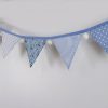 Rabbits and owls blue bunting with white pom-poms