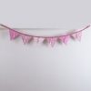 Ribbons and sequins bunting in pink