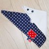 Navy-polka-dot-full-bandana-bib-red-patch-folded-BB001