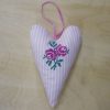 Deep pink cross-stitched rose heart
