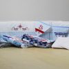Windjammer cot bumper with nautical bunting, quilts and Little Boats sheet set